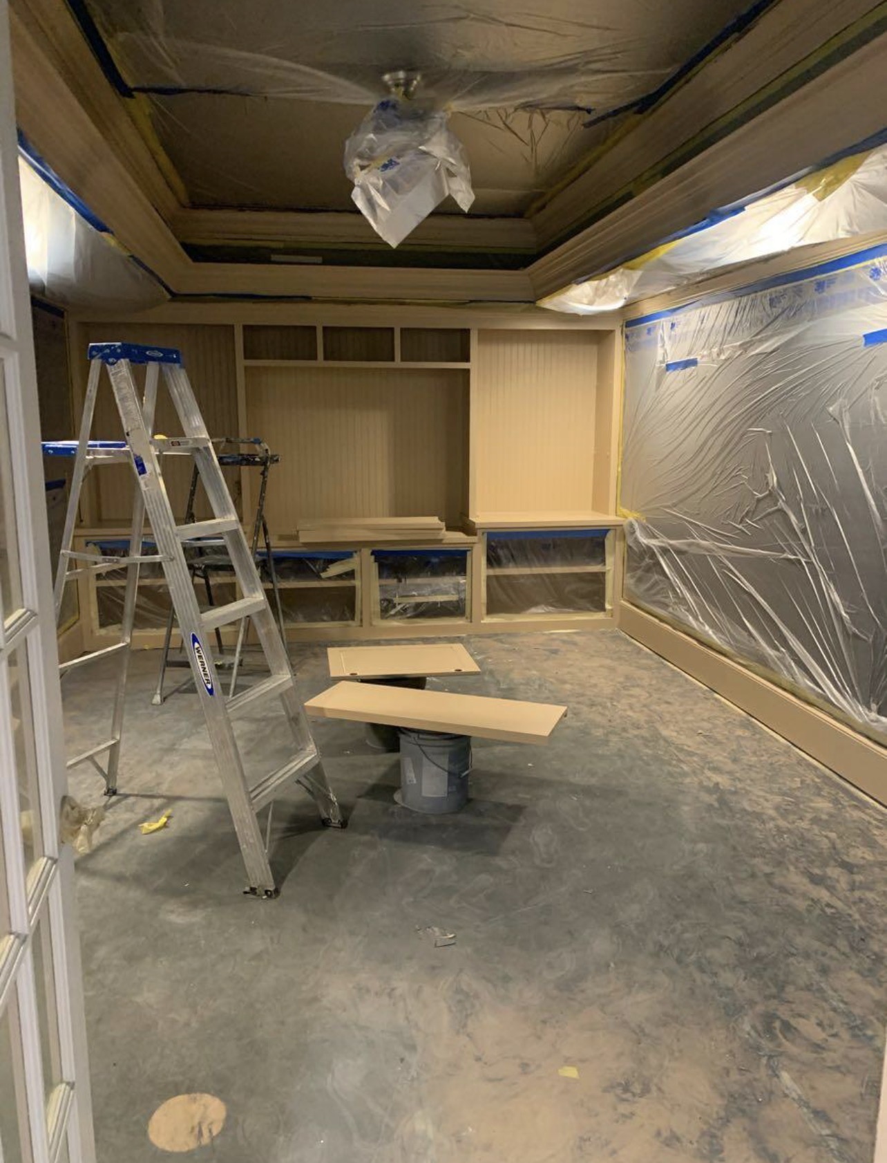 Careful masking and floor protection before painting