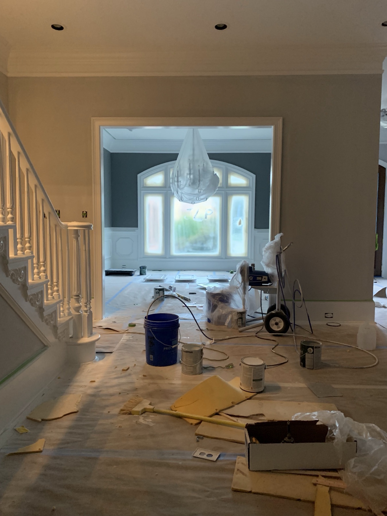 Whole-home interior masked and protected with a professional airless sprayer set up